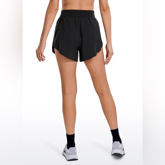 Feathery-Fit Soft Mid Rise Dolphin Lined Shorts 4'' - Picture 2 of 4